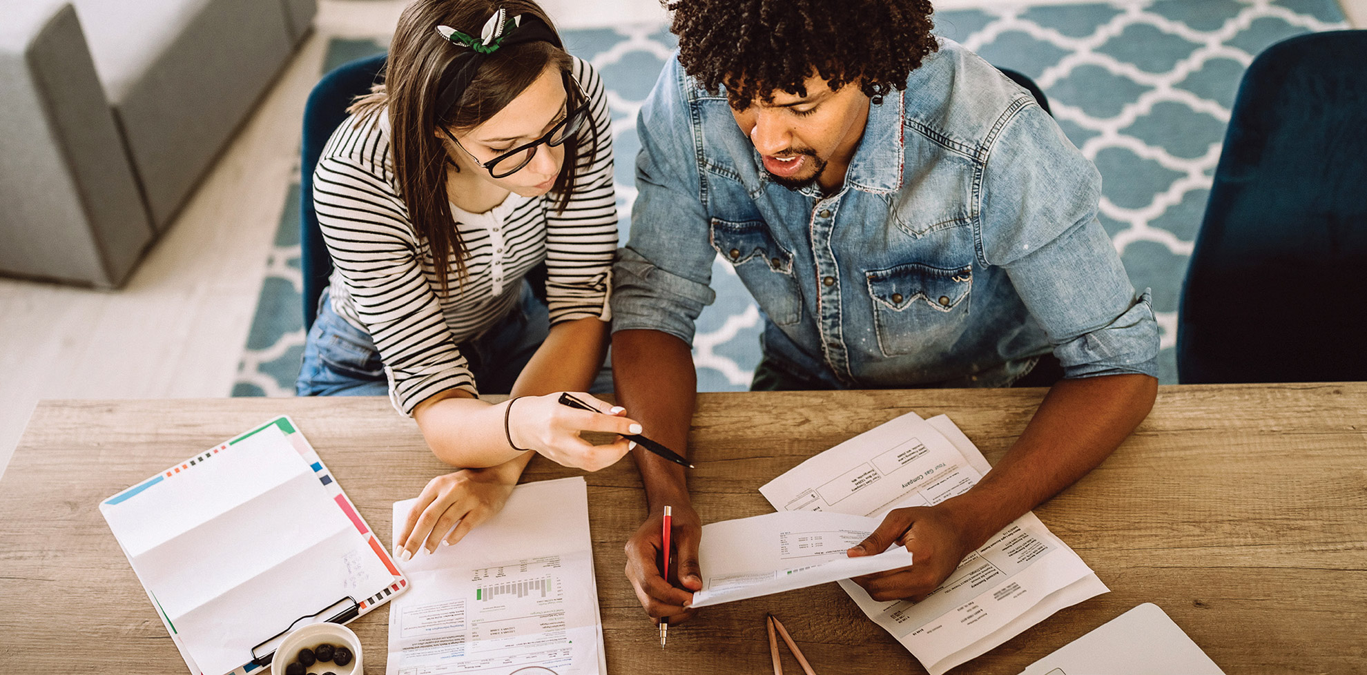 Couple working on financial paperwork